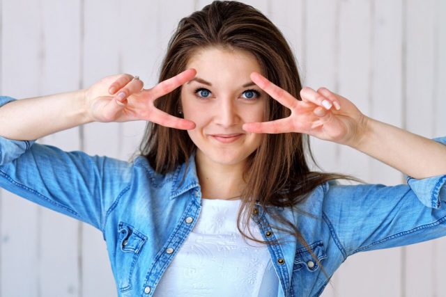 Woman Demonstrating Contact Lenses at The Eye Doctors in Eden Prairie, Minnesota